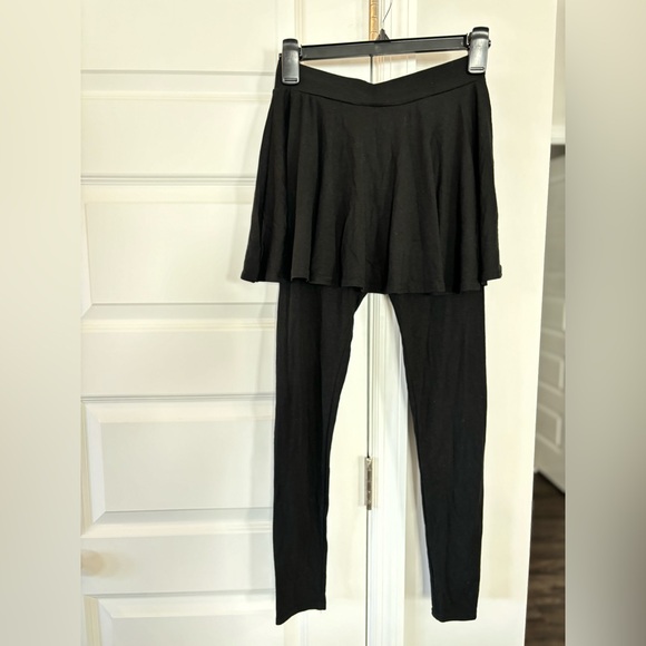 Small black cotton leggings with a skirt built over them. Never worn. - Picture 1 of 3